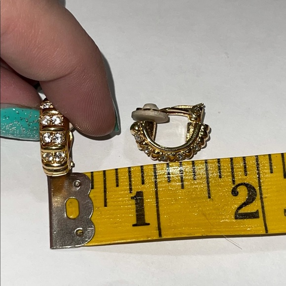 Signed Swarovski Crystal gold tone clip earrings - Picture 2 of 2